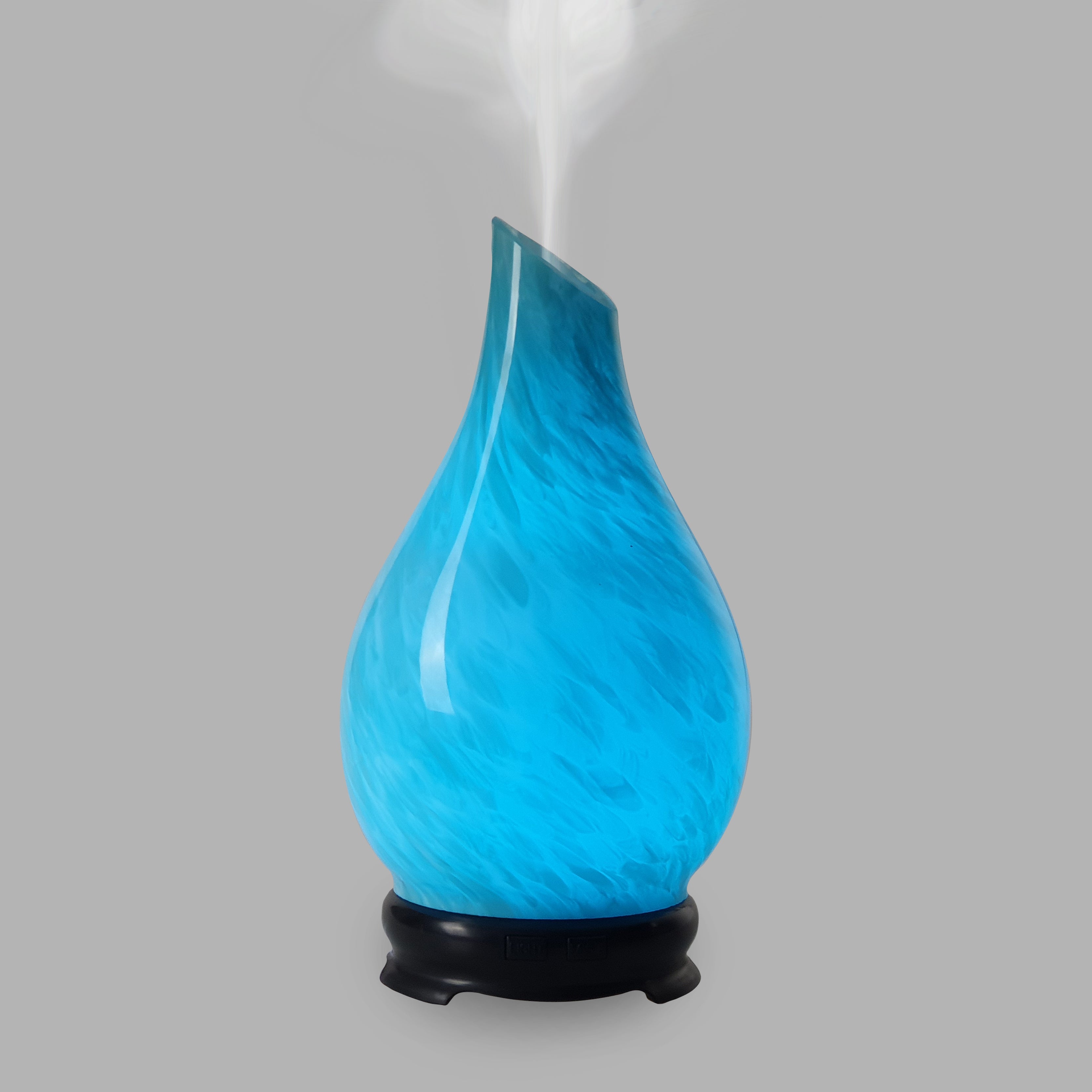 Perfect for the lovers of the ocean, this aromatherapy diffuser engulfs your room in blue as it reflects the beauty of the ocean.  