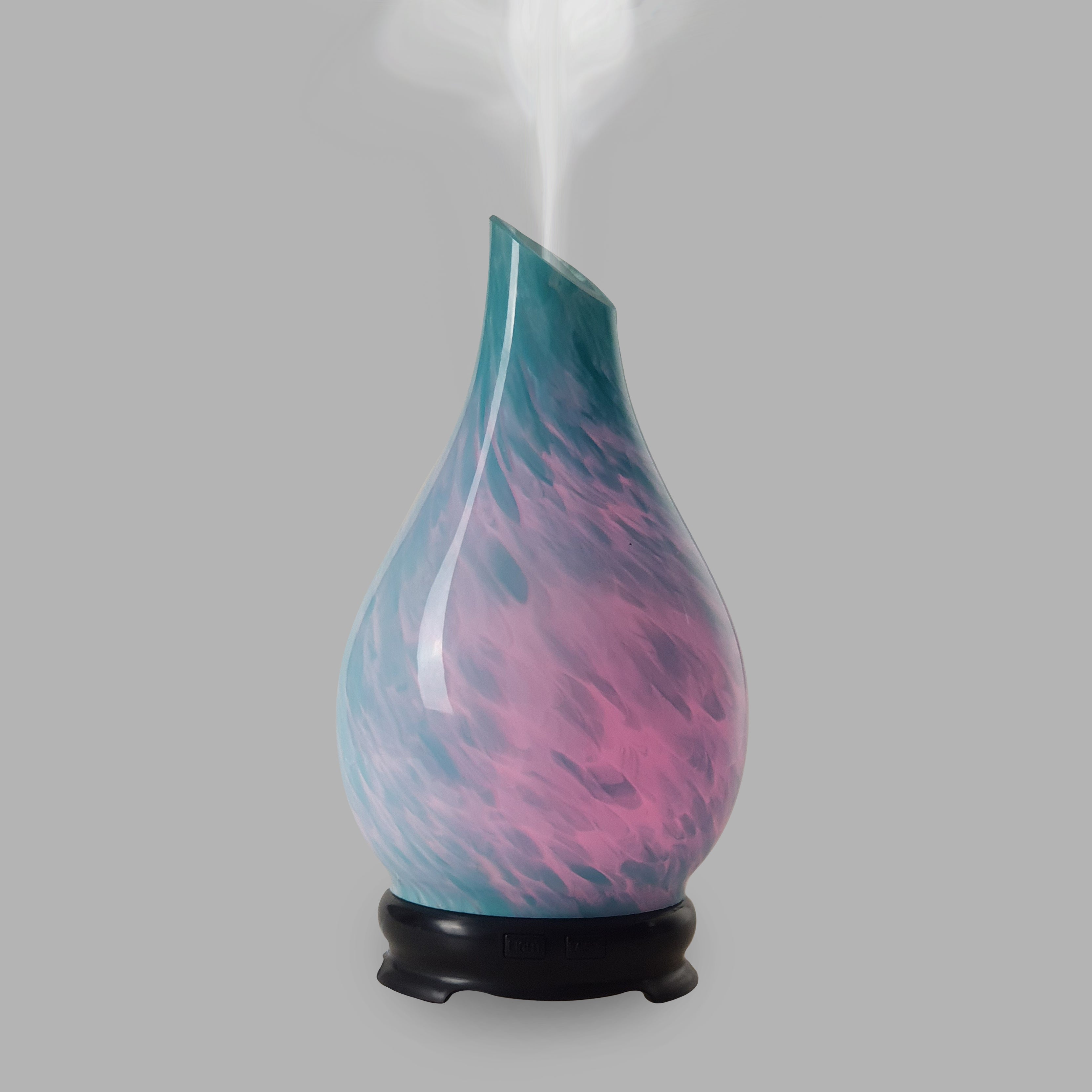 Perfect for the lovers of the ocean, this aromatherapy diffuser engulfs your room in blue as it reflects the beauty of the ocean.  