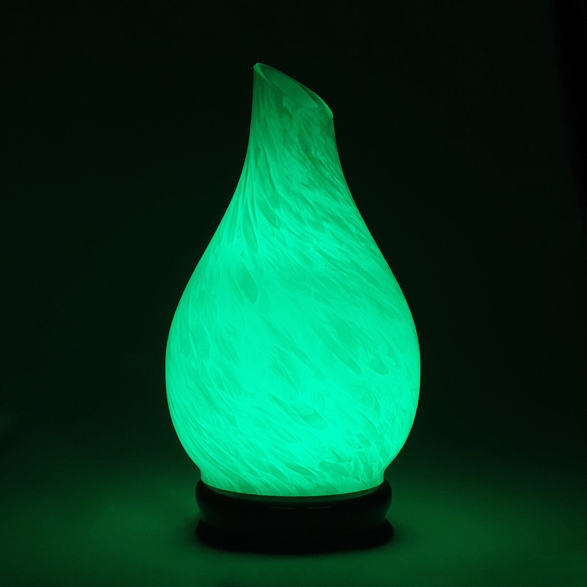 Perfect for the lovers of the ocean, this aromatherapy diffuser engulfs your room in blue as it reflects the beauty of the ocean.  