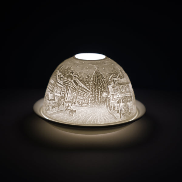 Stunning tealight dome featuring an eye-catching Carol singers design. 

The design is repeated around the whole of the tealight holder, creating a warm and atmospheric light.

Suitable for use with standard Scent Cups, tealights, or Votive Candles (tealights/candles not included).

Dimentions: 8 x 12 x 20