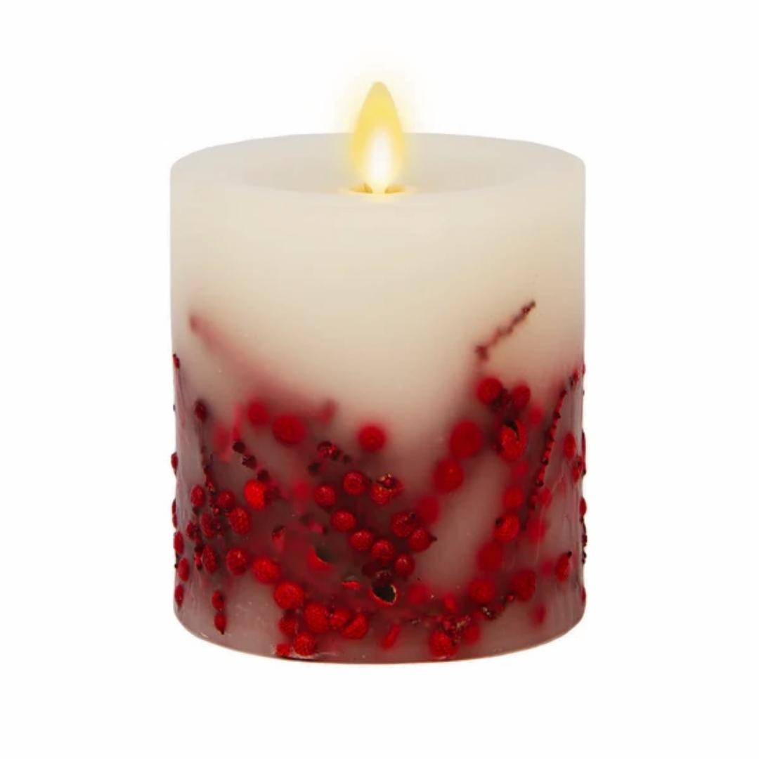 This Luminara Red Berry Inclusions Flameless Pillar is the fashion-forward centerpiece for all your candle décor needs. We selected this modern melted design to showcase the dancing Real-Flame Effect from all angles, ensuring endless decorating possibilities!