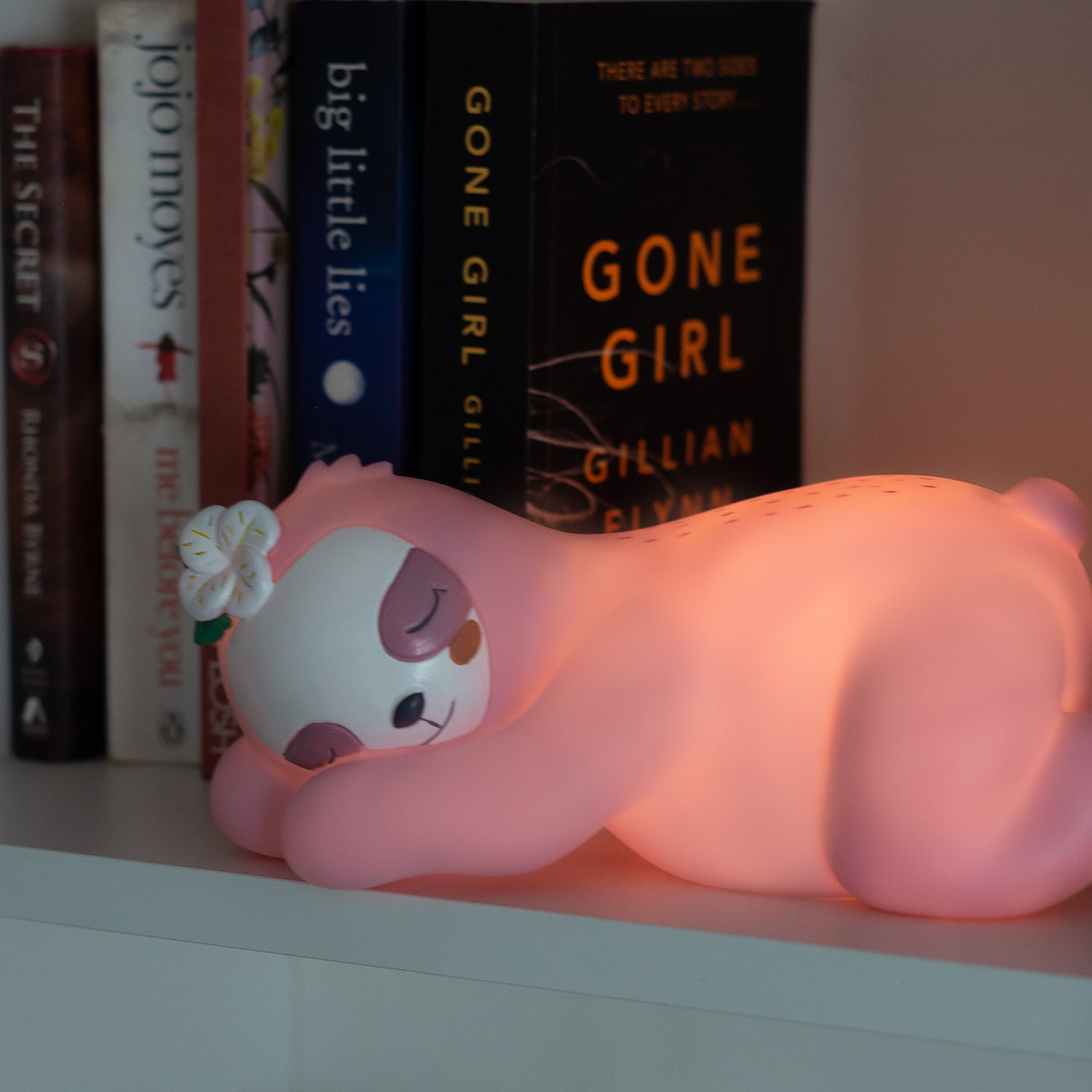 Sleeping sloth-shaped pink night light. These newest Night Lights are set to be an incredible décor addition to any little ones' room and an amazing gift idea for all occasions - birthdays, christenings, holidays, and just because! Boasting a collection of creatures that are sure to both delight and soothe kids of all ages, Night Lights come with custom packaging that features a fun poem and are powered by a USB cord to ensure the Night Light stays bright.