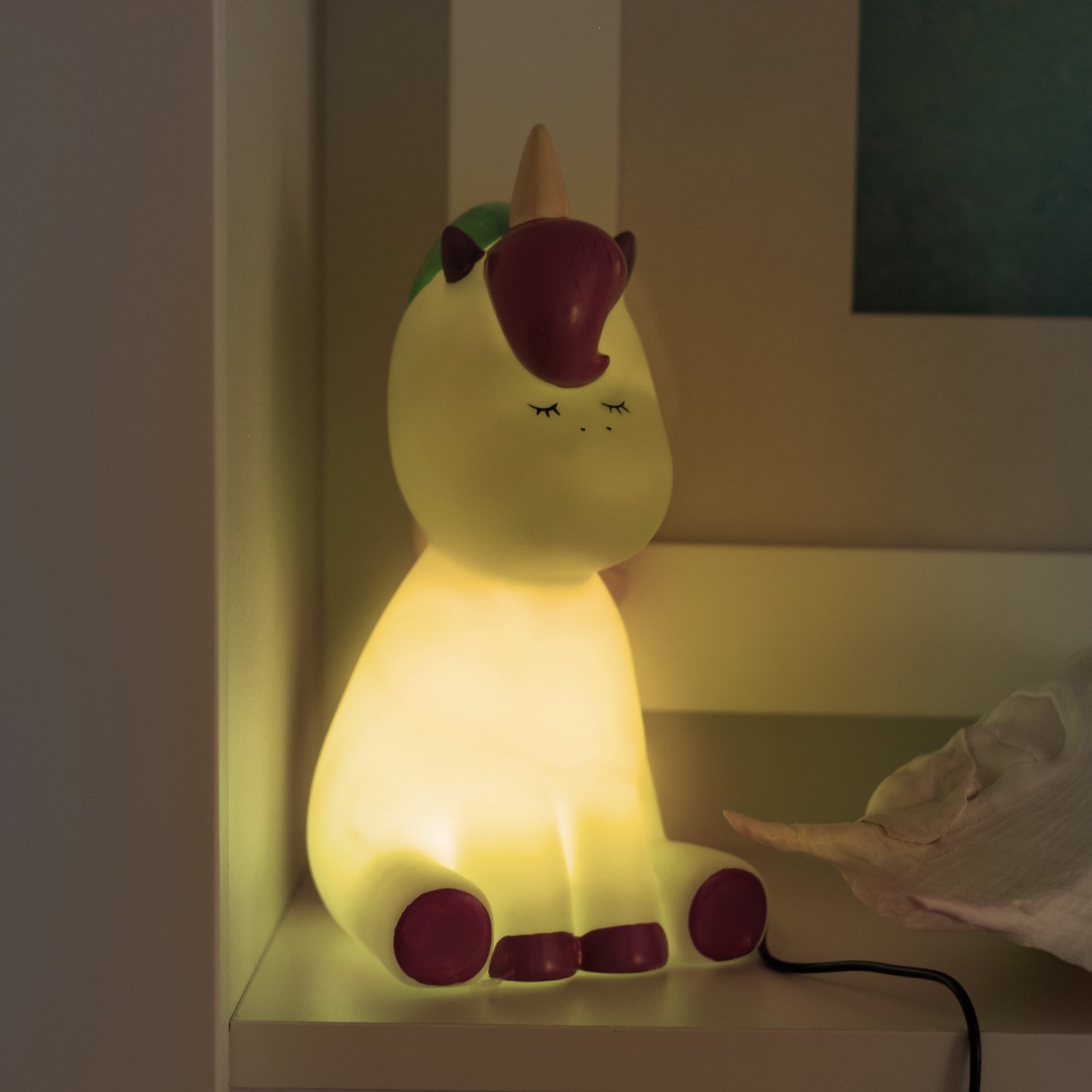 Sitting Unicorn-shaped blue night light. These newest Night Lights are set to be an incredible décor addition to any little ones' room and an amazing gift idea for all occasions - birthdays, christenings, holidays, and just because! Boasting a collection of creatures that are sure to both delight and soothe kids of all ages, Night Lights come with custom packaging that features a fun poem and are powered by a USB cord to ensure the Night Light stays bright.